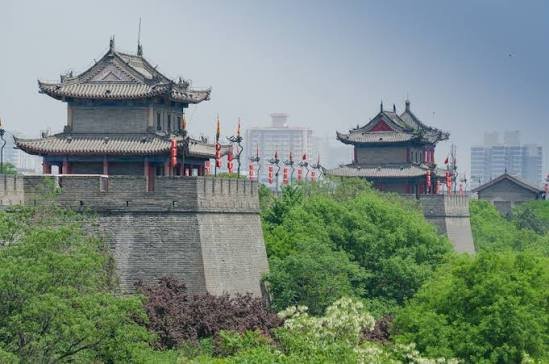 Xi'an city wall with brick ramparts and red lanterns